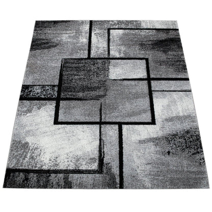 Black White Area Rug with Geometric Pattern and Modern Paint Effect - RugYourHome